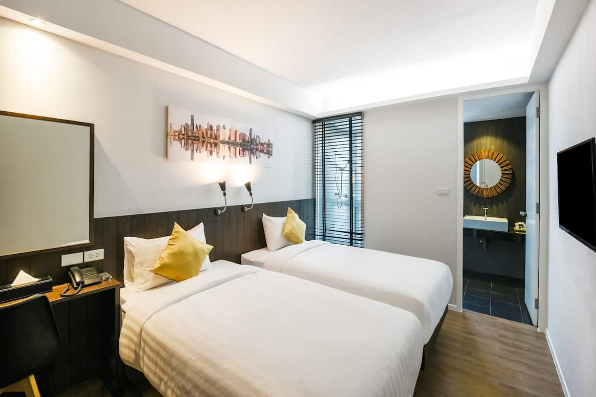 Desk, laptop workspace, free WiFi, bed sheets