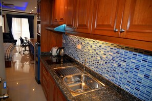 Studio | Private kitchen | Fridge, microwave, stovetop, electric kettle