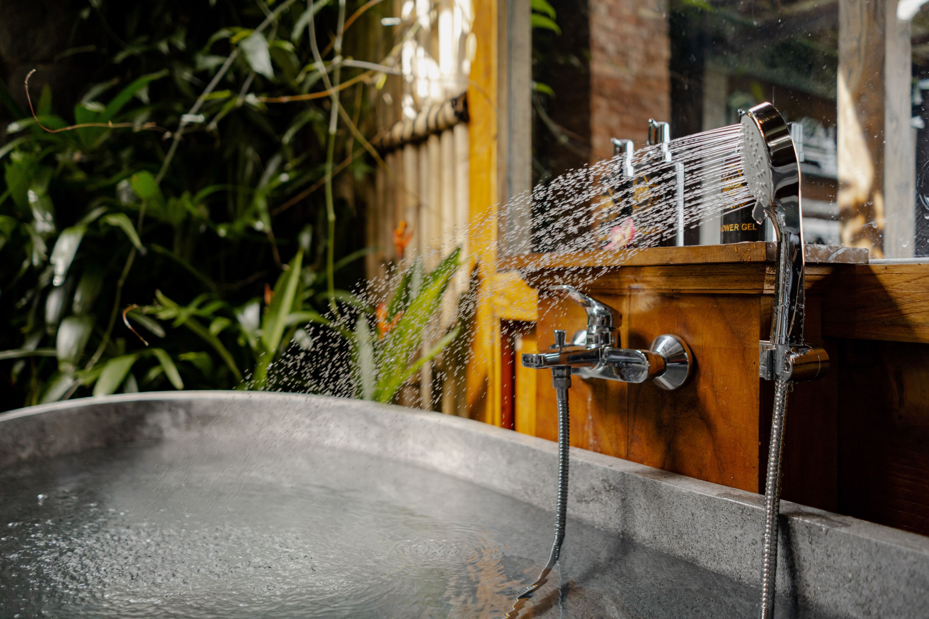 Separate tub and shower, rainfall showerhead, free toiletries