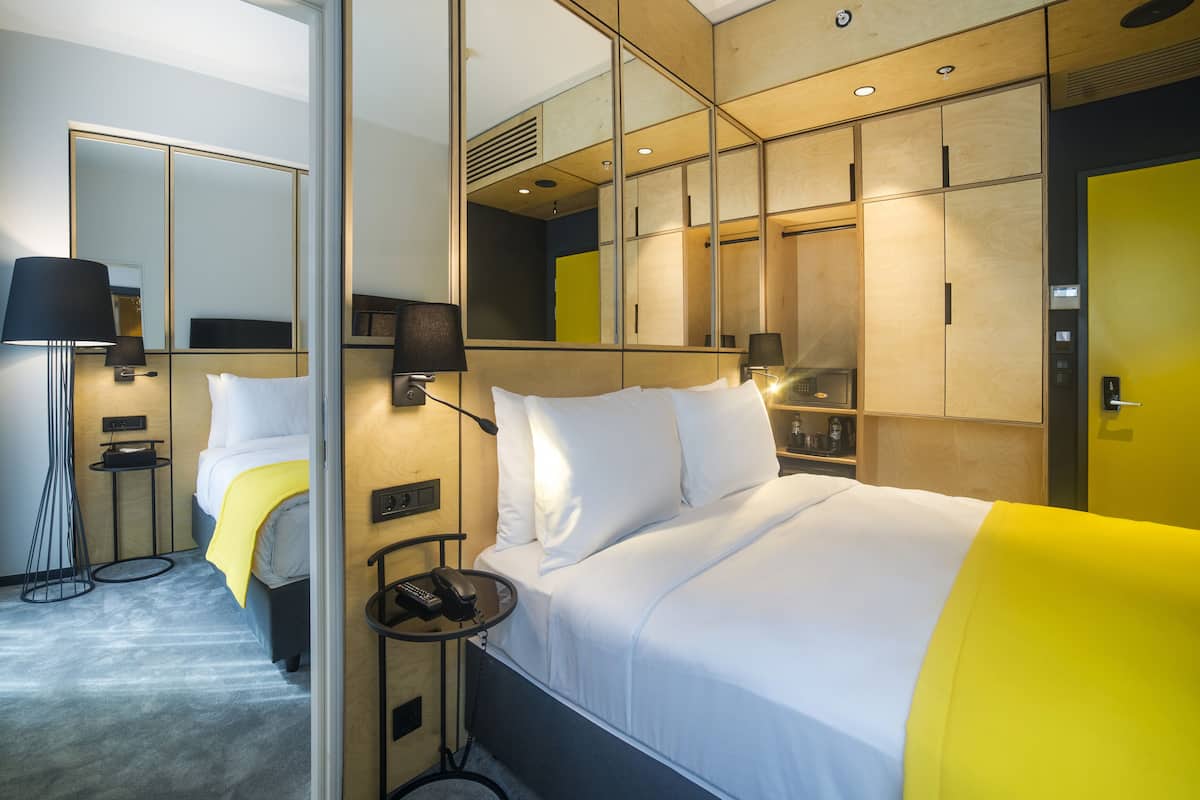 Family Quadruple Room | Egyptian cotton sheets, premium bedding, minibar, in-room safe