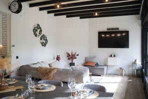 Smart TV, video games, DVD player, foosball