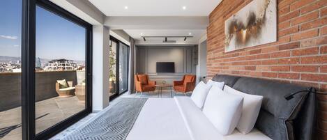 Luxury Studio Suite, 1 King Bed, Terrace | Hypo-allergenic bedding, minibar, in-room safe, desk