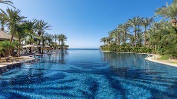 7 outdoor pools, pool umbrellas, sun loungers