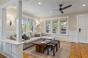 Smart TV, fireplace, books, stereo