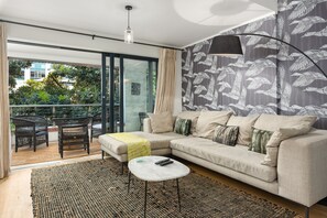 Departamento Deluxe | Área de sala de estar | Televisión de pantalla plana, Netflix y servicios de streaming 