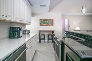 Fridge, oven, stovetop, coffee/tea maker