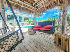 Terrace/patio - Beach House is a stunning and spacious 2bed/2bath with private pool & steps to Sombrero Beach! (Marathon)