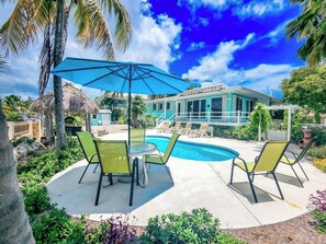 Outdoor dining - Beach House is a stunning and spacious 2bed/2bath with private pool & steps to Sombrero Beach! (Marathon)