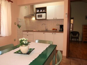 Fridge, microwave, toaster, cookware/dishes/utensils