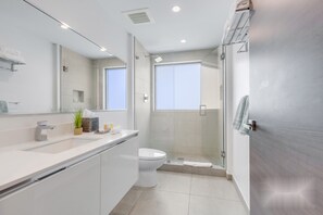 Shower, hair dryer, towels, soap