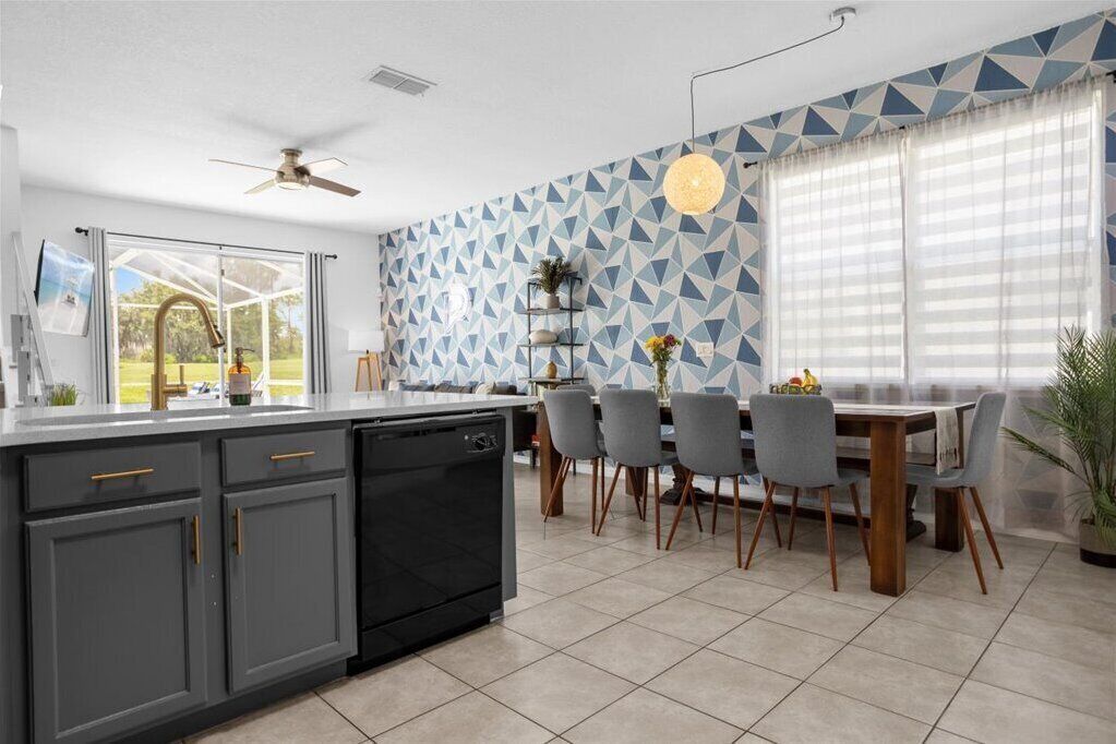 This charming 5-bedroom villa with a private heated pool is a modern oasis.