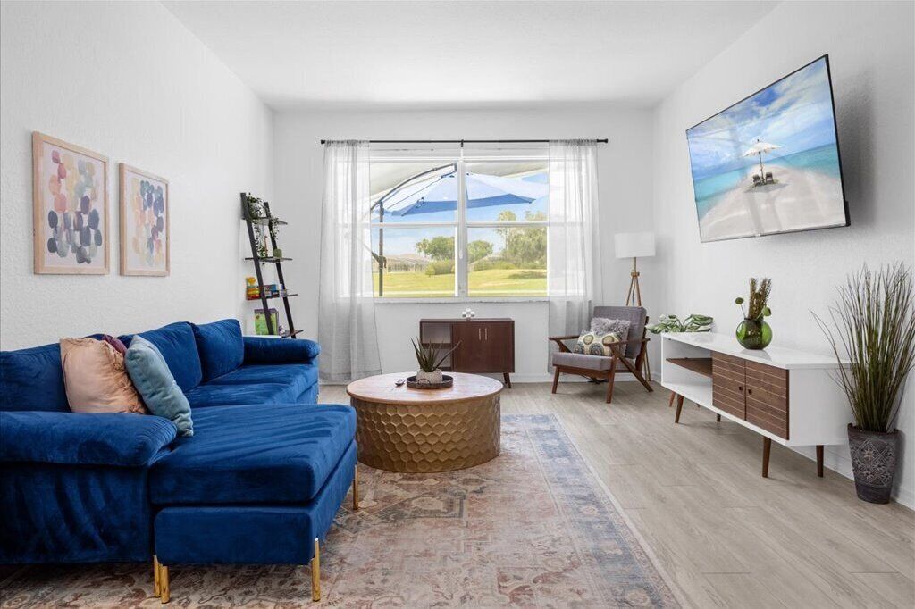 This charming 5-bedroom villa with a private heated pool is a modern oasis.