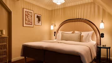 Junior suite, balkon | Hypoallergeen beddengoed, individueel gedecoreerd