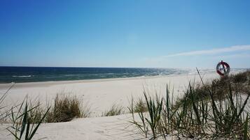 On the beach, white sand