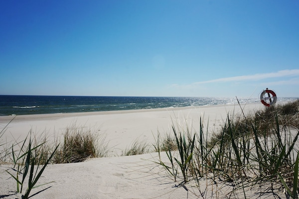 On the beach, white sand