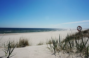 On the beach, white sand
