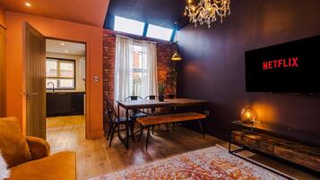 Design House | Living area | 50-inch Smart TV with cable channels, TV