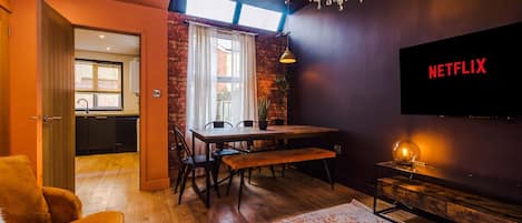 Design House | Living area | 50-inch Smart TV with cable channels, TV