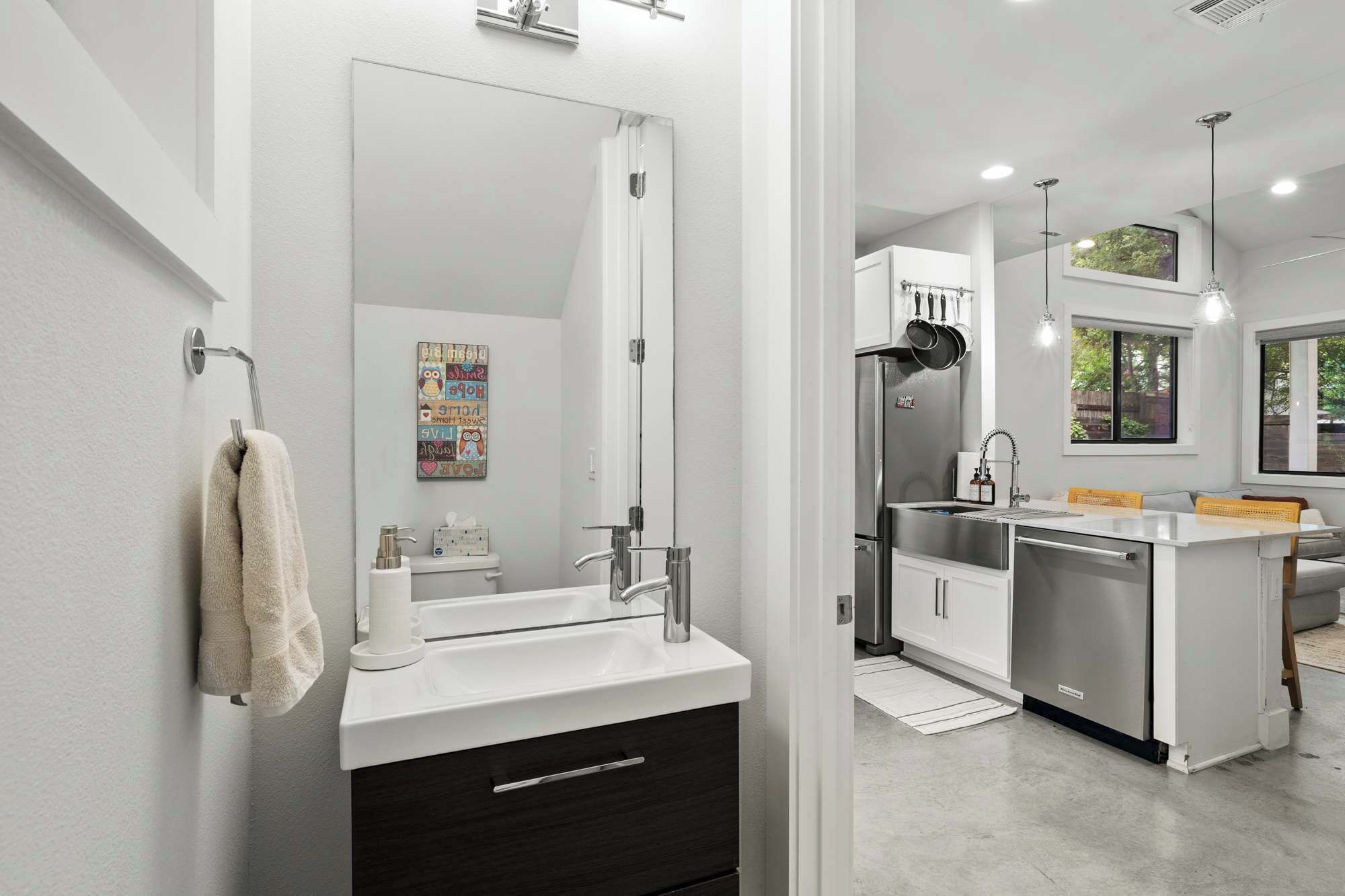 Combined shower/tub, hair dryer, towels, soap