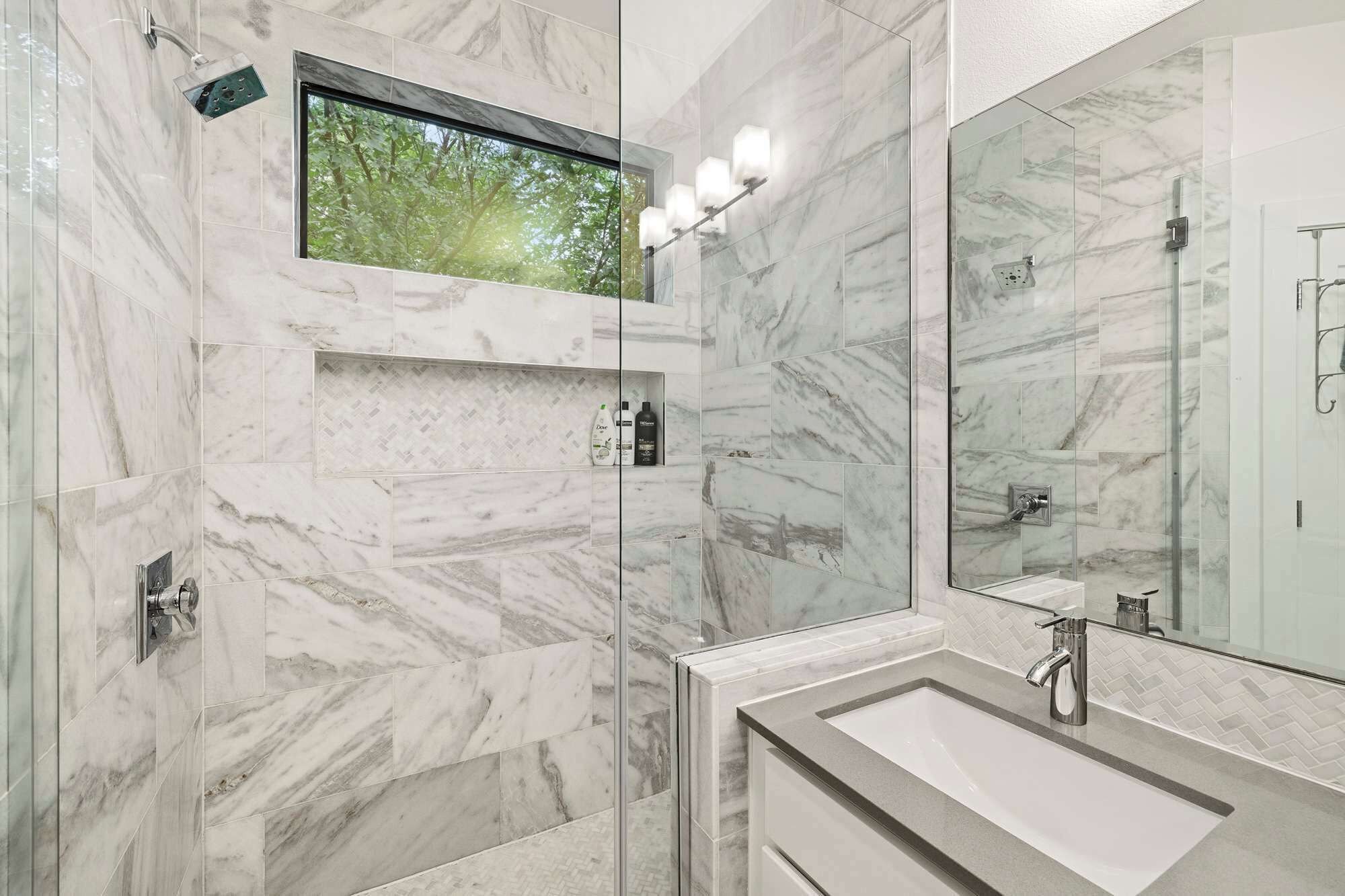 Combined shower/tub, hair dryer, towels, soap