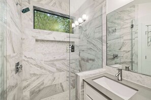 Combined shower/tub, hair dryer, towels, soap