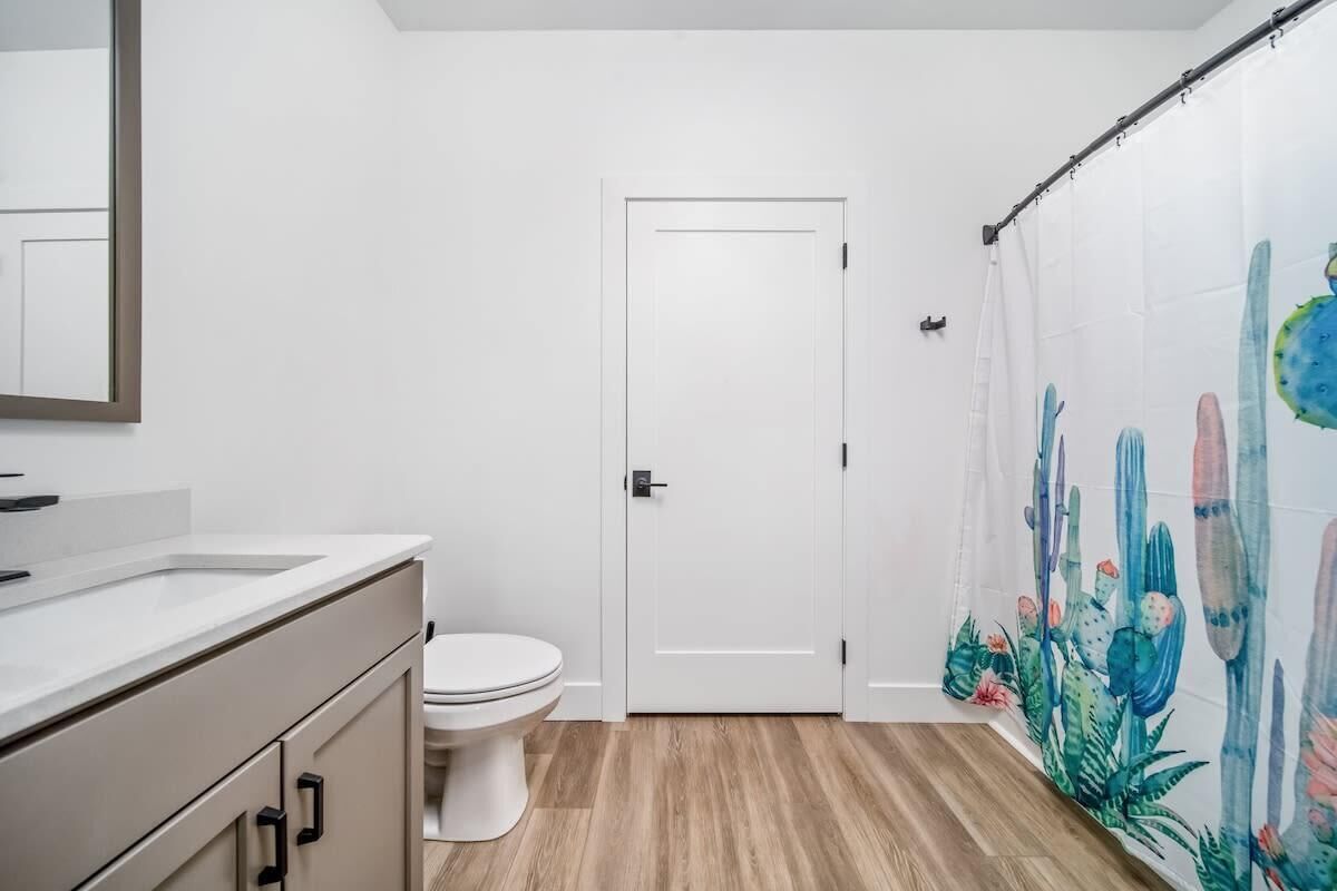 Bathtub, hair dryer, shampoo