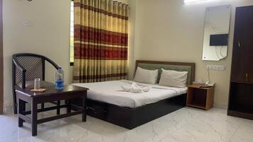 Premium bedding, down duvets, desk, laptop workspace