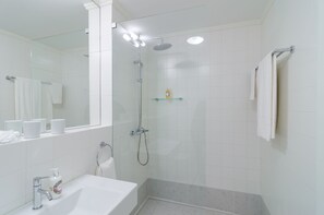 Superior Apartment | Bathroom | Shower, hair dryer, bathrobes, slippers