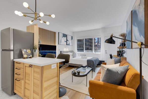 1 bedroom, desk, iron/ironing board, travel crib