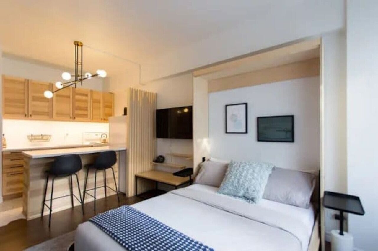 1 bedroom, desk, iron/ironing board, travel cot