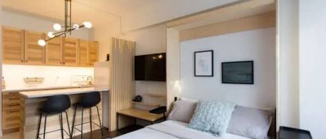 1 bedroom, desk, iron/ironing board, travel cot