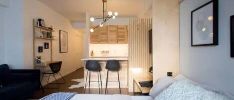 1 bedroom, desk, iron/ironing board, travel crib