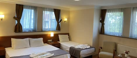 Superior Triple Room, Non Smoking, City View | Hypo-allergenic bedding, minibar, in-room safe, iron/ironing board