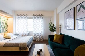 1 bedroom, desk, iron/ironing board, travel crib