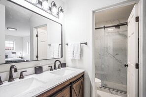 Bathtub, hair dryer, towels, soap