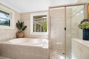Bathtub, hair dryer, towels
