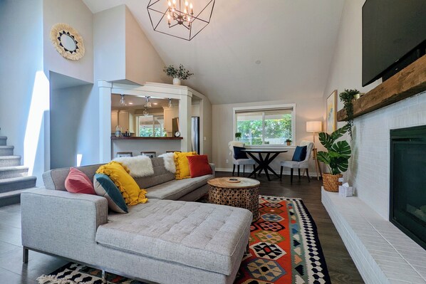 Smart TV, fireplace, books