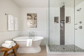 Bathtub, hair dryer, towels, soap