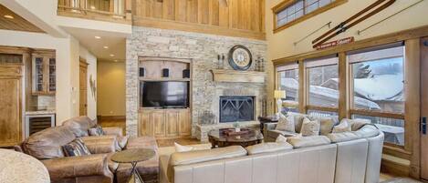 55-inch TV with digital channels, fireplace, streaming services