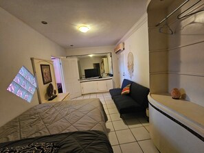 Deluxe Apartment, 1 Bedroom, Kitchenette, Ground Floor | 1 bedroom, memory-foam beds, individually decorated