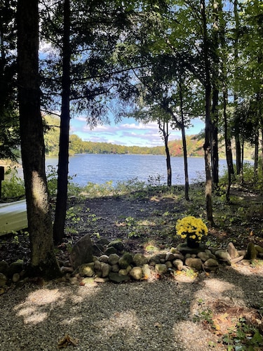 Waterfront camper in Adirondack-like setting