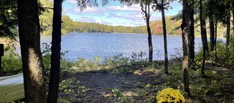 Waterfront camper in Adirondack-like setting