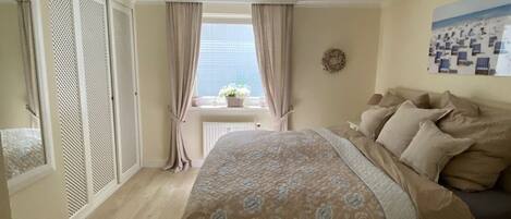 2 dormitorios, tabla de planchar con plancha, wifi