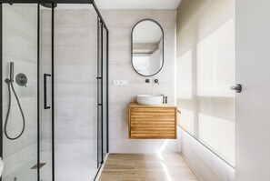 Bathtub, hair dryer, towels