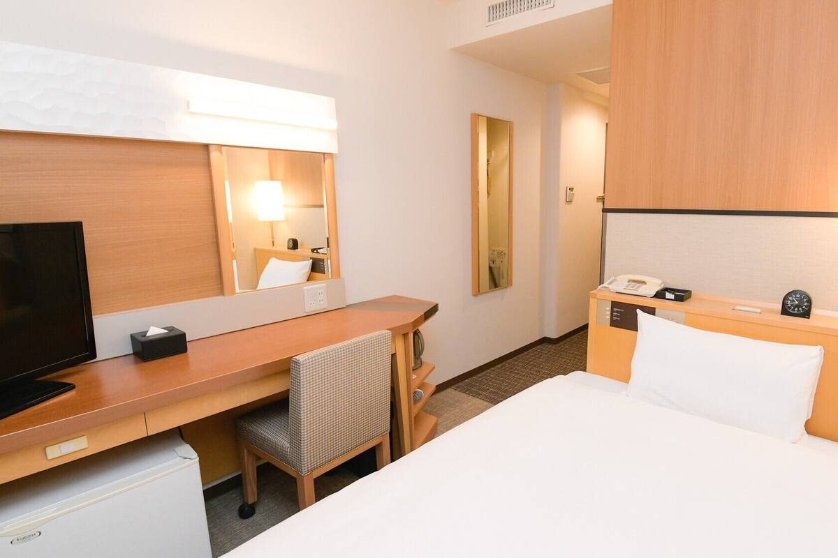 Down comforters, desk, WiFi (free), bed sheets