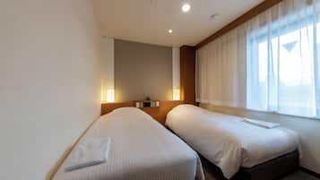 Twin Room, Smoking | Down comforters, desk, free WiFi, bed sheets