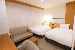Down comforters, desk, free WiFi, bed sheets