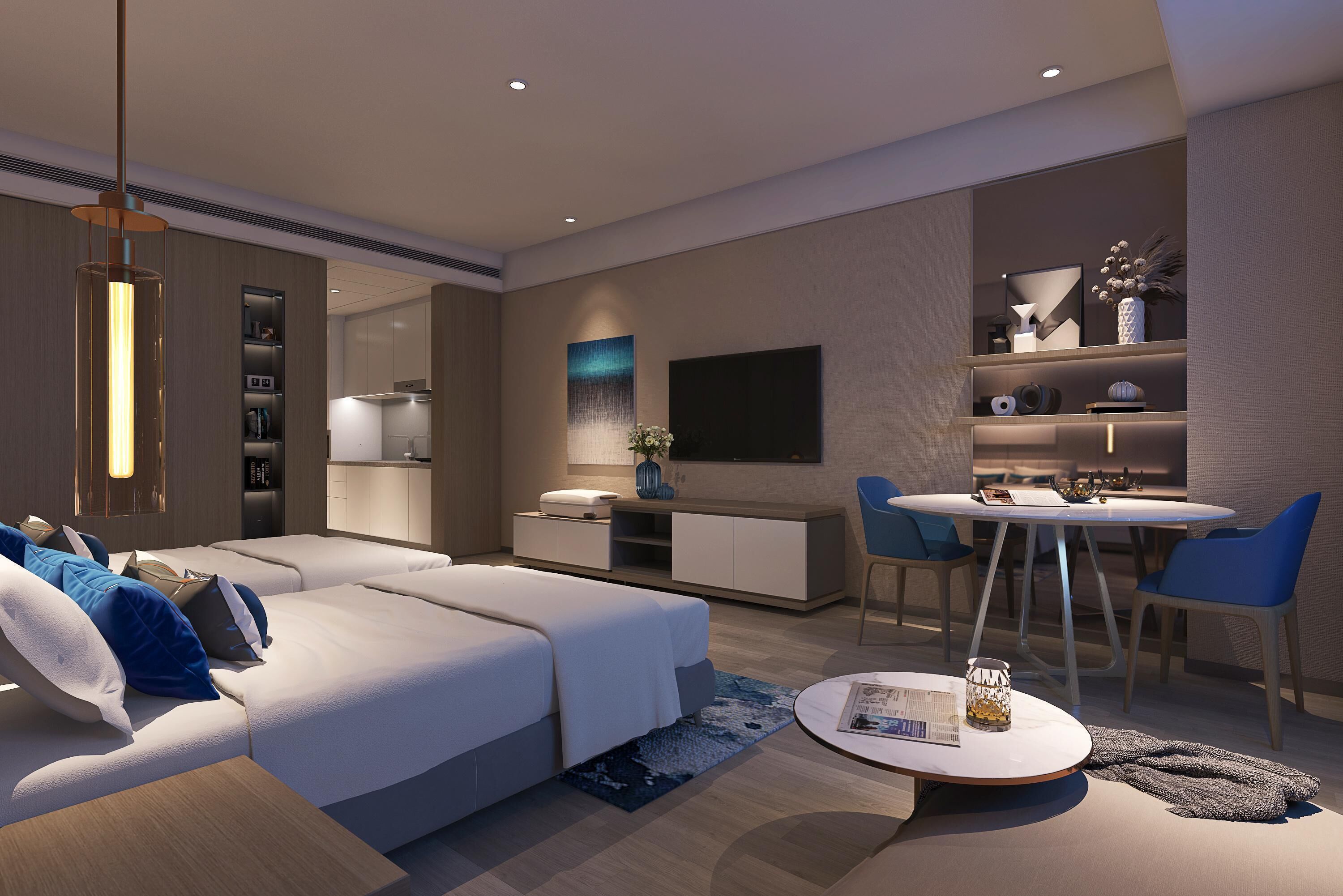 A modern living room with a sofa, a dining table, and a TV.