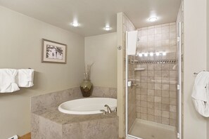 Combined shower/tub, hair dryer, towels, soap