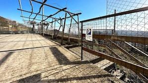 A parking area with a sign indicating private parking.